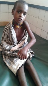 A young Orma girl who was treated successfully with good Antivenom from a Red Spitting Cobra bite.