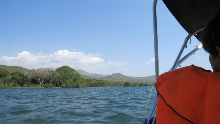 Sailing to Sindo past the volcanic Gembe Hill