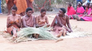 Rwandese maidens waiting to receive king Red Rocks community centre, Rwand