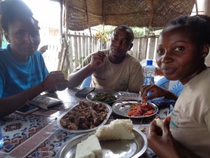 Everlyne Kitavi, Christine Mwendwa and Charles Mwendwa enjoying local cuisine at Mutito village on the foothills of Mutito Hills - Kitui county - pic copyright Rupi Mangat