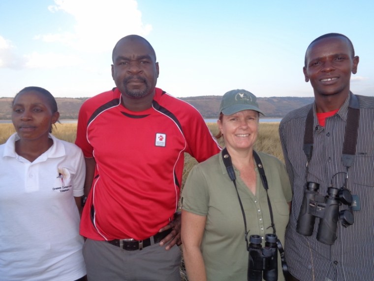 The research team: L-R -  Mary Waweru Master’s student at Kenyatta University, Osiman Mabhachi and Kerryn Morrison from South Africa of the International Crane Foundation and Endangered Wildlife Trust,  George Ndung’u, founder of the Nyahururu Bird Club, Olbolossat Biodiversity Conservation Group and the Crane Conservation Volunteers. at  Lake Ol Bolossat  Copyright Rupi Mangat