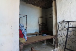 Inside the five-century-old house of Bwanamkuu Mohamed Hamdu- typical structure with galleries - note bed on right is a few centuries old from India - Pate island Copyright Maya Mangat