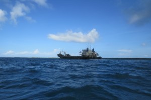 Chinese barge sailing from the high sea past Manda island to Lamu mainland where the Lamu port is being constructed. Copyright Rupi Mangat