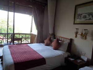 Beautiful room at Paraa Safari Lodge by the Nile in Murchison Falls National Park - notice the picture above - it's of Ripon Falls at Jinja - the source of the Nile - now submerged becuase of the dam downstream Copyright Rupi Mangat