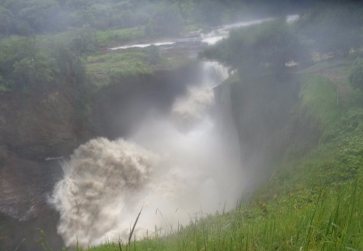 Murchison Falls - from the top. The Bakers' chanced upon it in 1864 coming back from Lake Albert (again they were the first European explorers to see it). Their boat was raised out of the water by a hippo and they had to jump on shore! Copyright: Rupi Mangat
