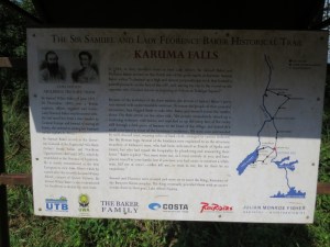 Almost hidden sign by Karuma Falls telling the story of the Bakers' sighting of the rapids in 1864 Copyright Rupi Mangat