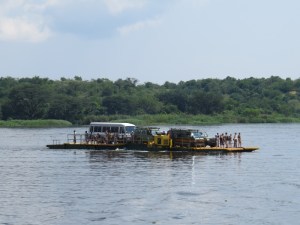 Crossing the Nile - on the ferry near Paraa Safari Lodge Copyright Rupi Mangat