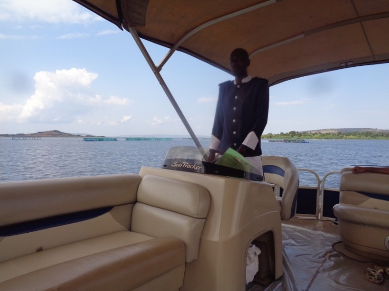Captain Masanja of Jinja Sailing Club sailing us down the Nile from the mighty Victoria at Jinja, Copyright Rupi Mangat