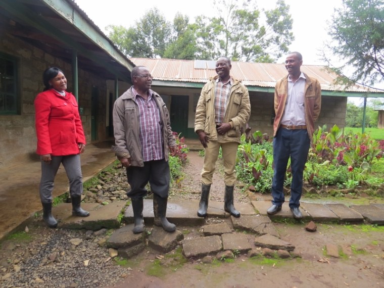 Mr Kinyua (2nd left) and Njogu (1st rght) at Gathiuru forest office on Mount Kenya - - copyright Rupi Mangat