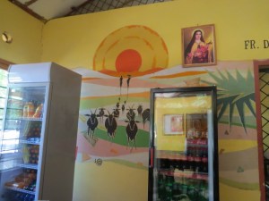 Saint Teresa’s Pastoral Centre on the banks of the Turkwel - mural painted by the Hawa artists in 2004 in Lodwar from paints made of natural desert sands on site. Copyright Rupi Mangat