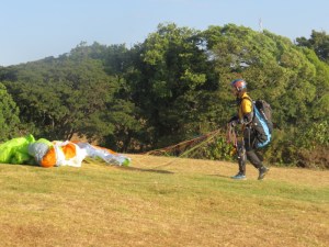 Paraglider on Elgeyo Marakwet escarpment getting ready to take off. Copyright Rupi Mangat