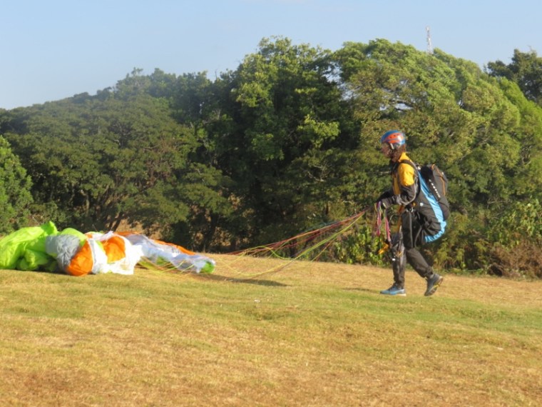 Paraglider on Elgeyo Marakwet escarpment getting ready to take off. Copyright Rupi Mangat