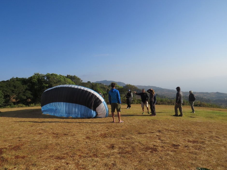Paragliders on Elgeyo Marakwet escarpment getting ready to take off. Copyright Rupi Mangat