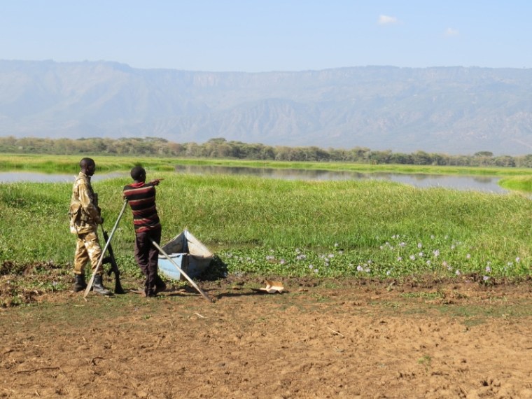 Lake Kamnarok with Elgeyo Marakwet range. Notie water hyacinth the weed choking the lake. Copyright Rupi Mangat
