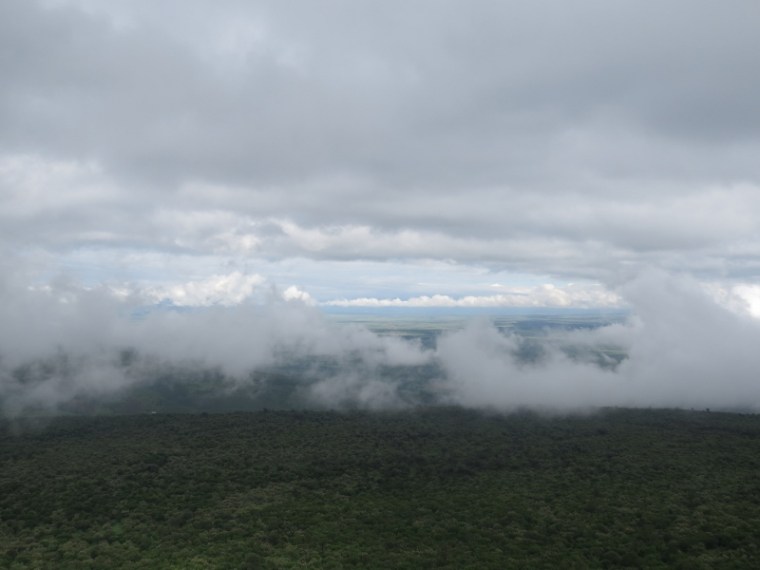 Rain clouds hurtle down the escarpment to fill the deep valley of the Great Rift. Copyright Rupi Mangat 