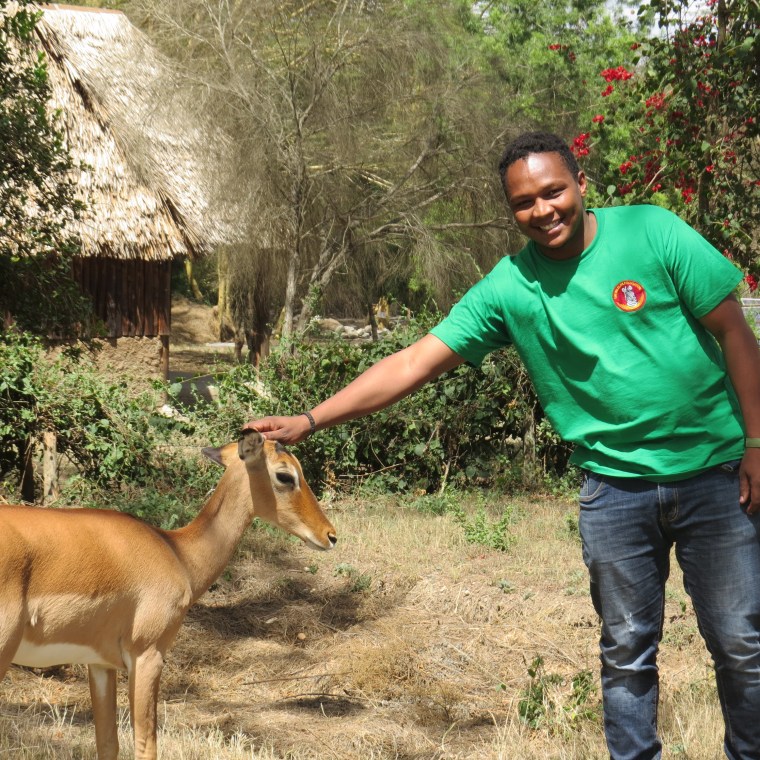 Jacob Tunoi of The Wildlife Foundation at Naretunoi Conservancy, Kitengela with Impi the Impala Copyright Rupi Mangat