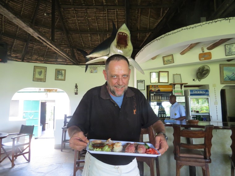 Eddie Aniere with his creation Sushi and Sashimi platter at Malindi Sea Fishling Club. Copyright Rupi Mangat