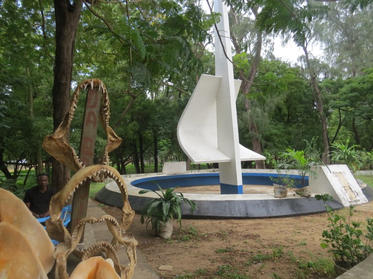 The Mast to honour Barthelomew Diaz and kiosk selling shark jaws in Malindi. Copyright Rupi Mangat